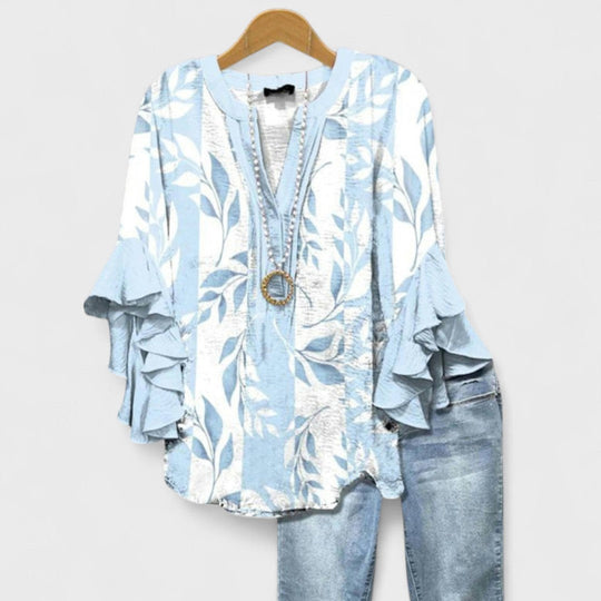 The BloomRuffle Elegance Blouse